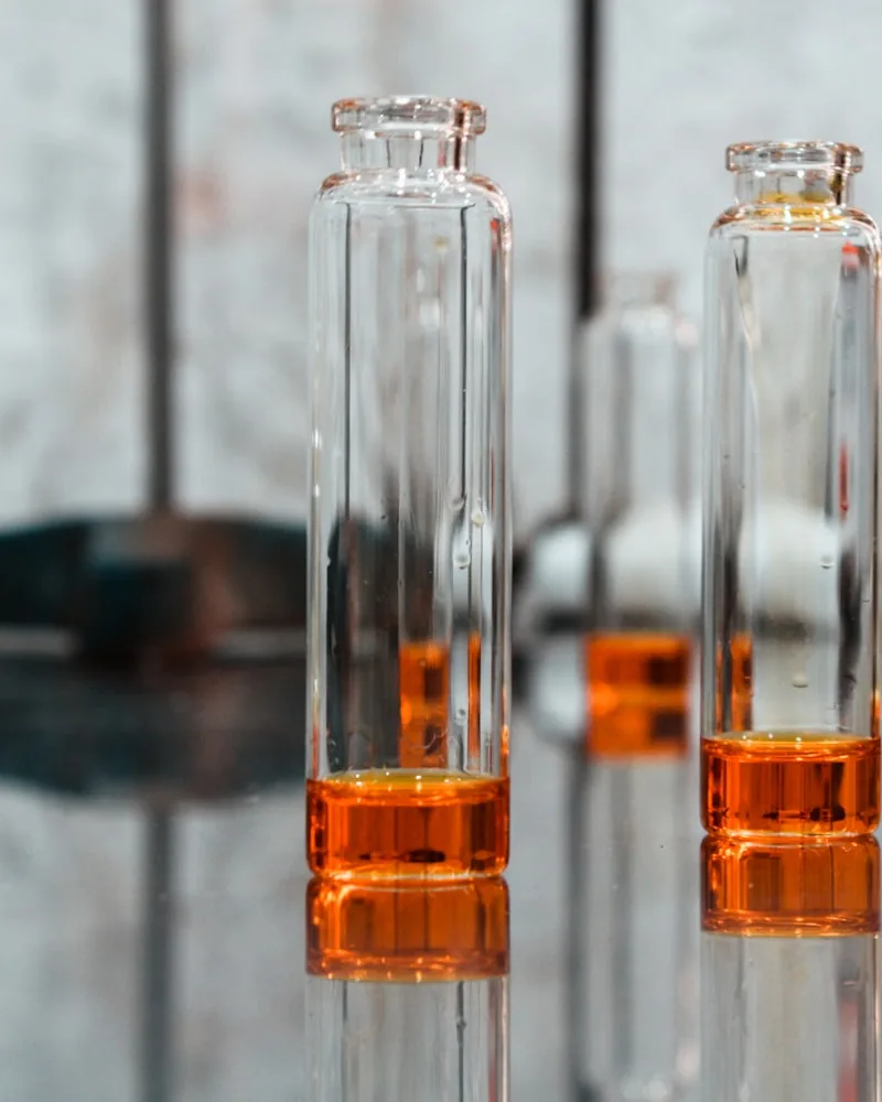 Amber vials filled and ranked for assay
