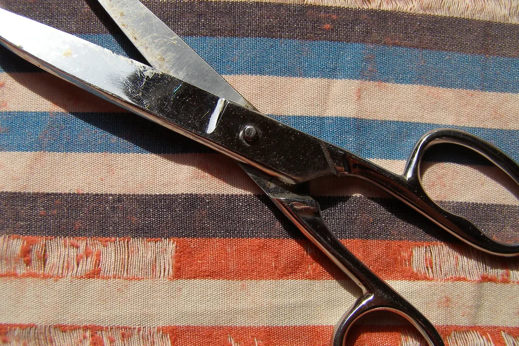 shears on striped cloth