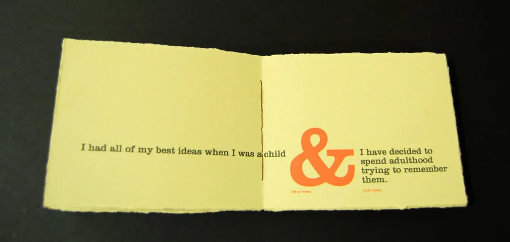 book spread with ampersand